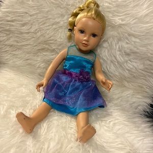 B) Gently used doll. Free with purchase of 2 or more dresses